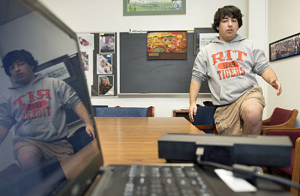 High school student Eric Solender demonstrates his Kinect-enabled tool for diagnosing concussions.