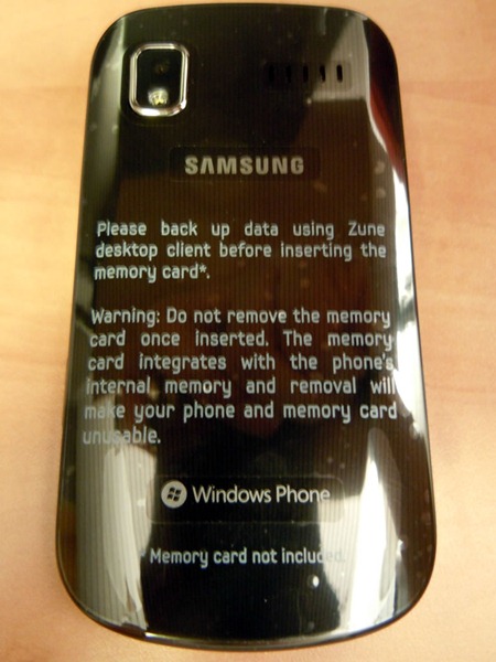 Back of Samsung Focus phone with sticker explaining memory card usage