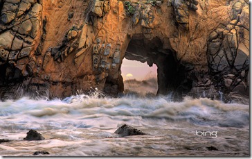Waves and sea spray through a sea arch at Pfeiffer Beach in Big Sur, California -- Patrick Smith/Visuals Unlimited, Inc