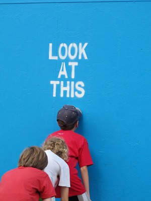 Kids looking at wall