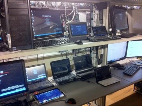 Image of the Windows test labs with many different types of laptops, tablets, and desktop machines