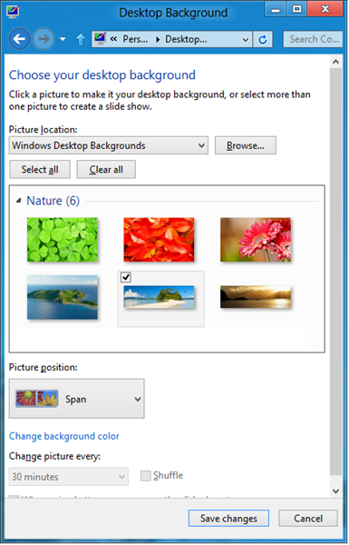 Снимок экрана страницы выбора фона рабочего стола с параметром растягивания изображения на все мониторы