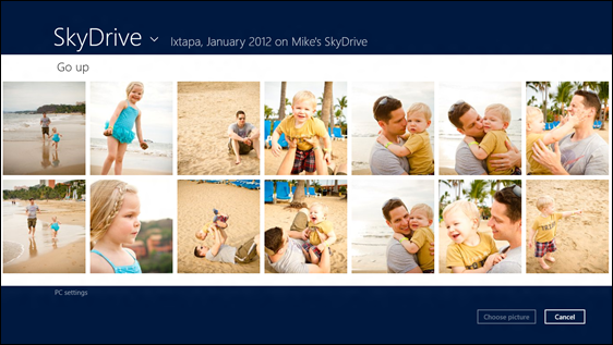 На иллюстрации показан альбом SkyDrive, содержащий несколько фотографий мужчины и его детей, а также кнопки: "Выбрать фотографию" и "Отмена".