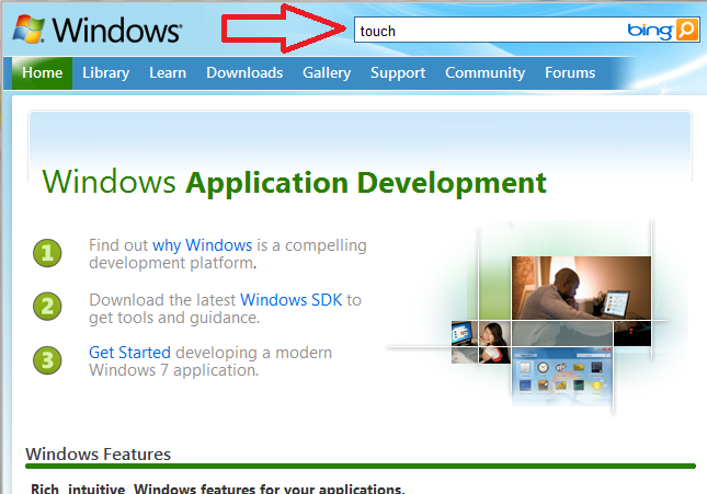 image with arrow pointing to search box for Windows developer center