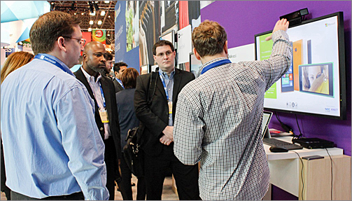 Microsoft's Kinect-enabled intelligent signage system drew crowds at the 2015 National Retail Federation trade show.