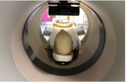 The Kinect sensor will be mounted above the patient's head in the PET scanner.