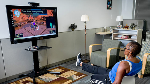 Under the watchful eye of the Kinect sensor, a patient performs her physical therapy regimen from the comfort and convenience of her own home.