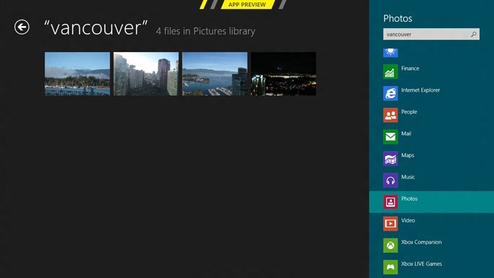 Приложение "Фотографии" запущено и отображает результаты поиска для слова "Vancouver" (Ванкувер). Открыта панель поиска с переданным запросом поиска для слова "vancouver".