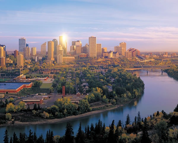 Edmonton skyline, with North Saskatchewan River in foreground.