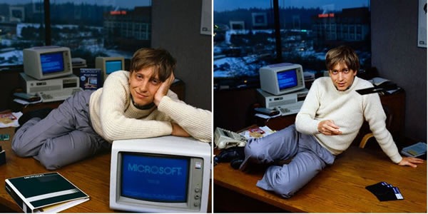 Bill Gates posing sexily on a desk with an old IBM PC running MS-DOS