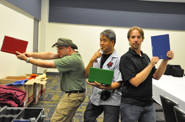 Rick Claus, Joey deVilla and Rodney Buike strike the "Charlie's Angels" pose with Dell netbooks