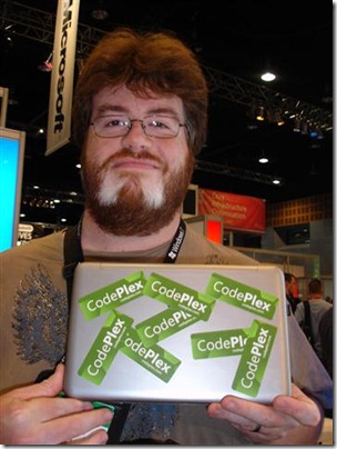 TechEd Australia Attendee holding notebook with lots of CodePlex stickers on it