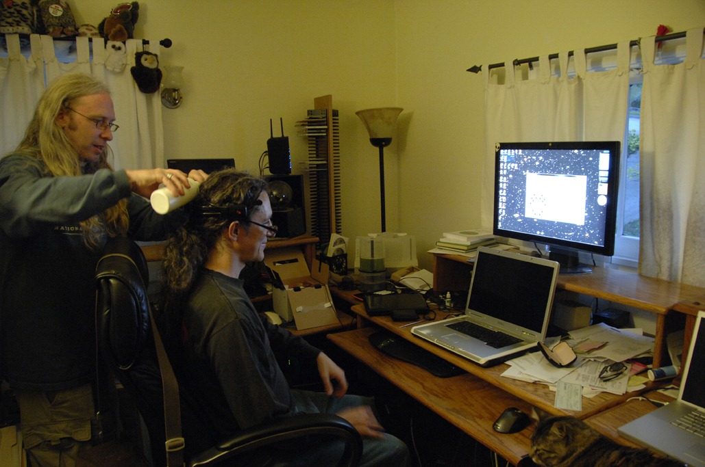 Jim Galasyn wears the neuroheadset for the first time. Photo: Isobel Alexander