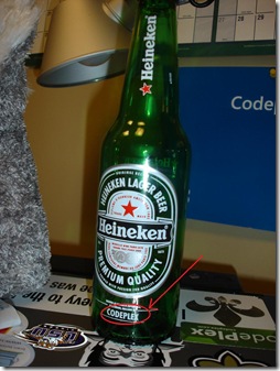 CodePlex labeled Heineken bottle next to a Koala bear's butt