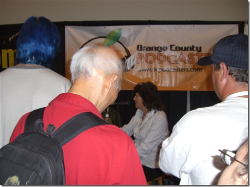 bright blue hair at the OCPodcasting booth
