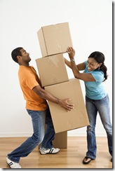 Couple with moving boxes. (c) iClipArt