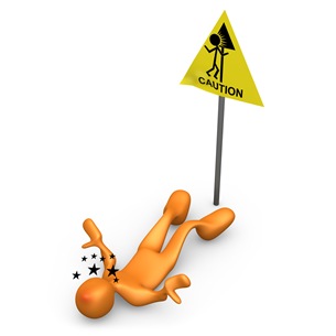 Orange Person Seeing Stars And Lying On Their Back After Slipping In Front Of A Caution Sign Clipart Illustration Image