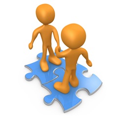 Clipart Illustration of Two Orange People On Blue Puzzle Pieces,