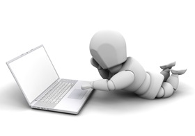 Clipart Illustration of a White Character Lying On His Belly And Using A Laptop