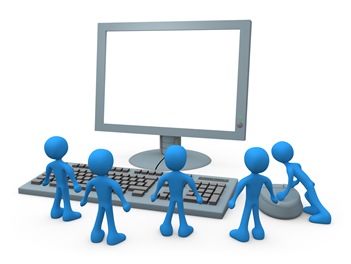 Group Of Tiny Blue Employees Standing In Front Of A Computer Keyboard And Looking Up At A Flat Screen Lcd Monitor Screen While One Person Operates The Mouse Clipart Illustration Graphic